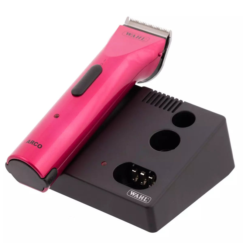 Black Wahl Arco Cordless Trimmer with blade attached in charger