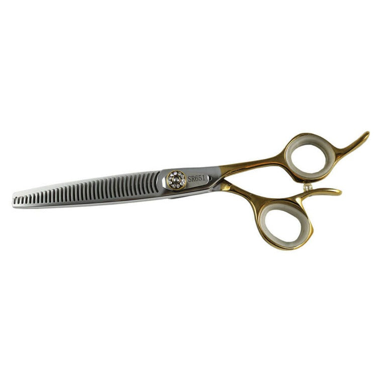 Convex thinning scissor with gold handle recently sharpened